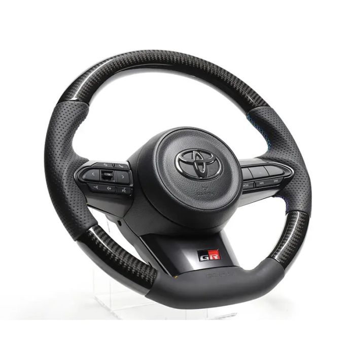 Volante GReddy de carbono negro con costuras de 3 colores para Toyota Yaris GR GXPA16