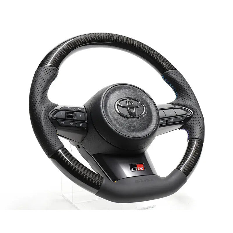 Volante GReddy de carbono negro con costuras de 3 colores para Toyota Yaris GR GXPA16