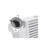 Mishimoto MMTMIC-WRX-08SLBL Top-Mount Intercooler Kit for 08-14 Subaru WRX, silver with blue hose.