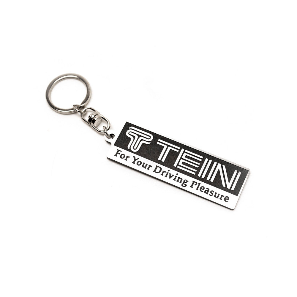 Llavero con placa del logo Tein